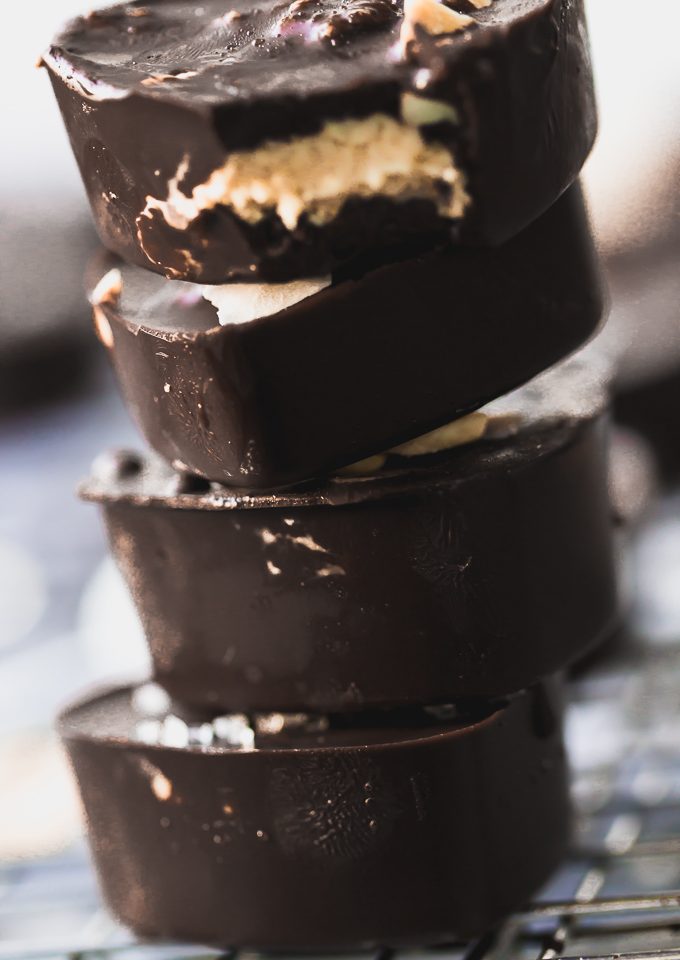 Bite-sized dark chocolate cashew butter filled candy, refined sugar-free, paleo friendly, dairy-free, gluten-free, and vegan|www.mannaandspice.com